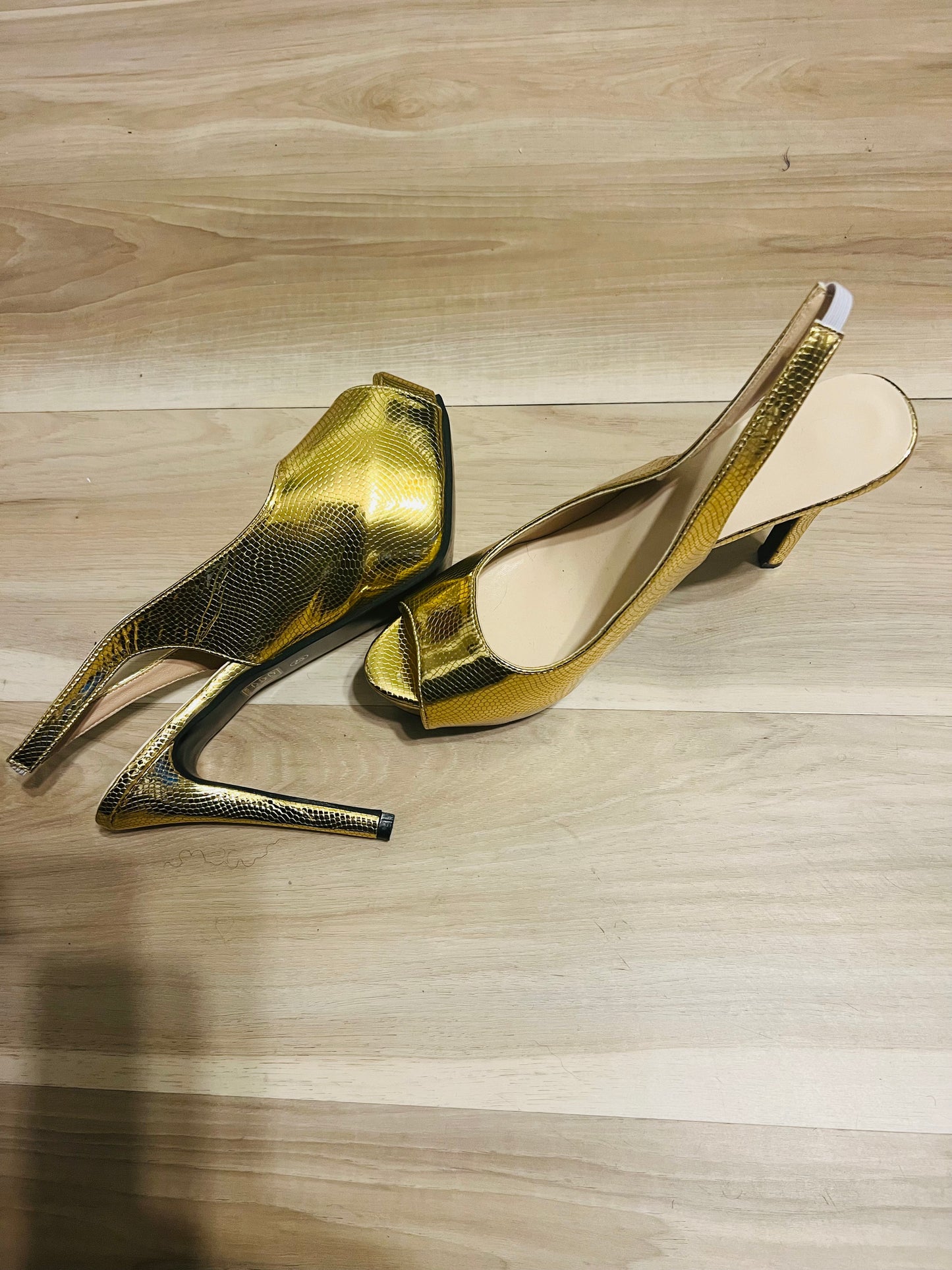 Gold slingback heels