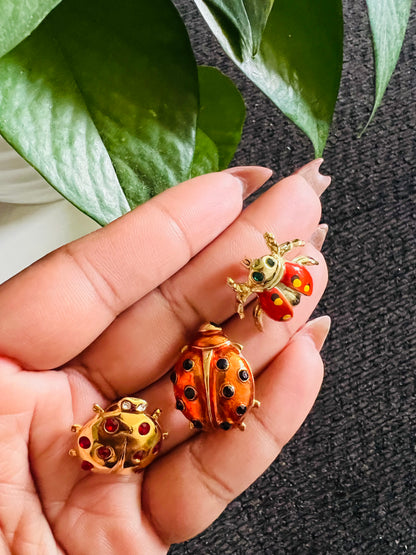 Vintage ladybug brooches