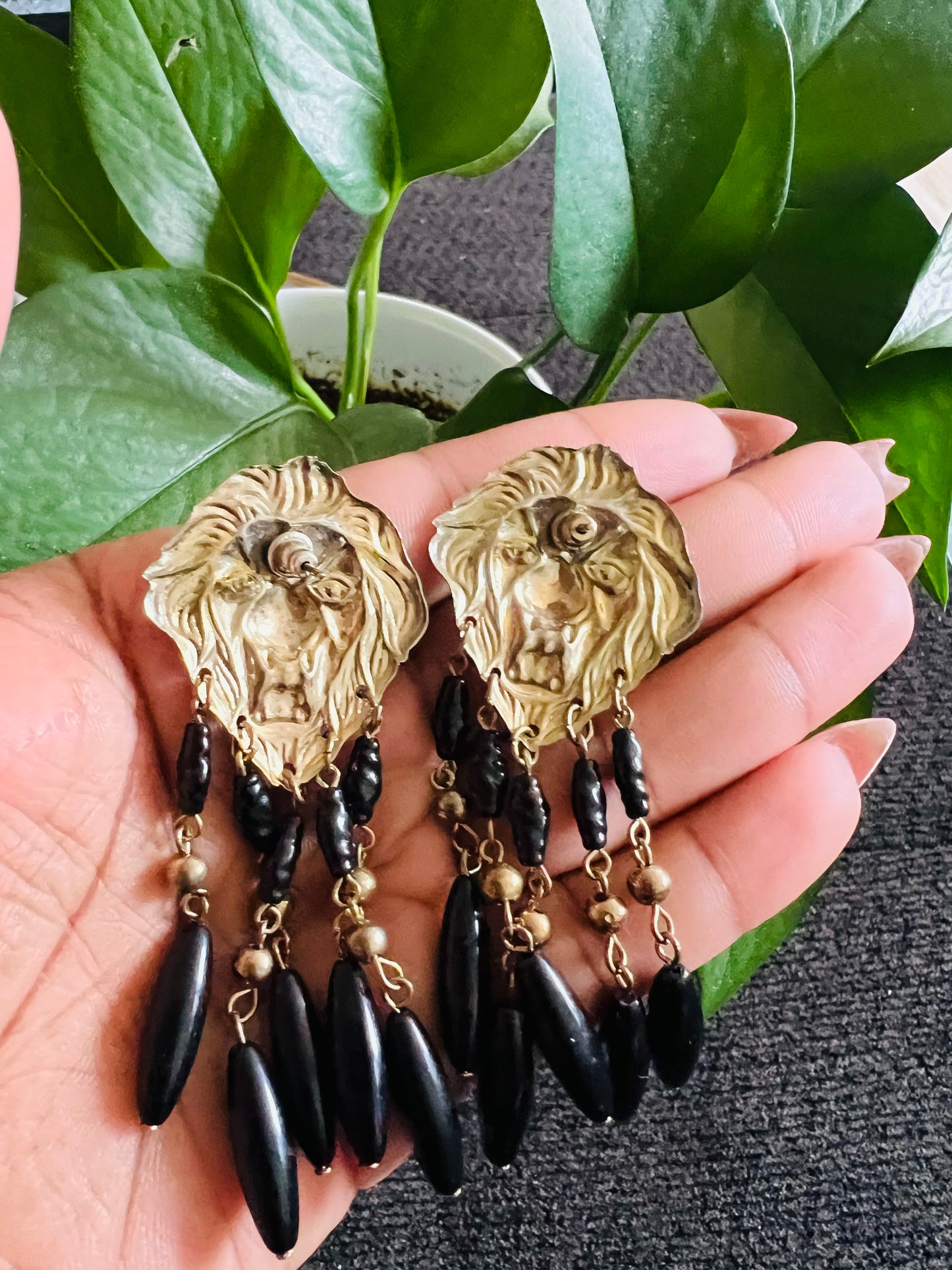 Vintage lions, head, black, and gold hanging pierced earrings